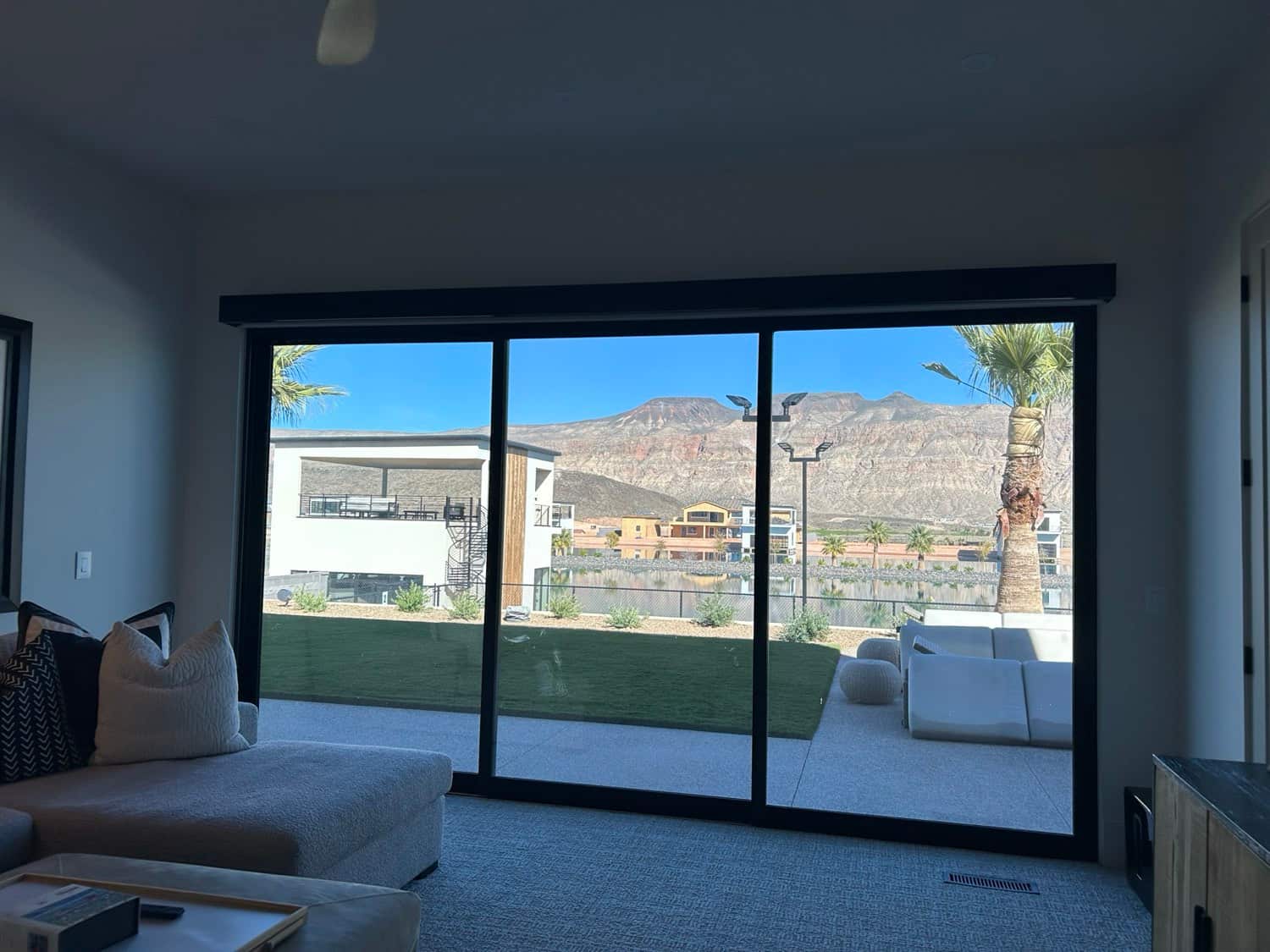 Tinted sliding-glass wall overlooking Southern Utah red-rock mountains