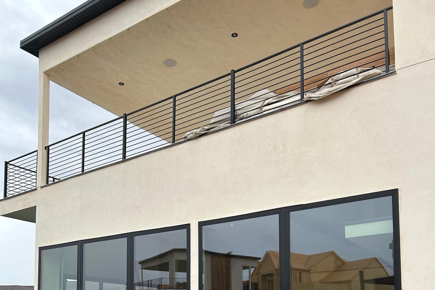 Waterfront Southern Utah rental property with full-height glass facing the water