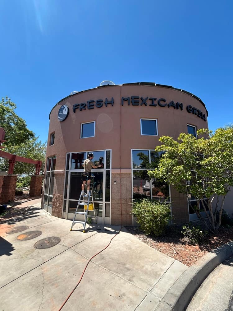 Fresh Mexican Grill storefront tint install in progress